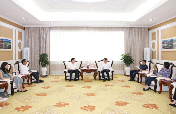 张子建与伟光汇通集团董事长陆学伟一行会谈